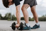 It's built around training with a percentage of your one-rep ma. (Photo via Pexels/Anete Lusina)
